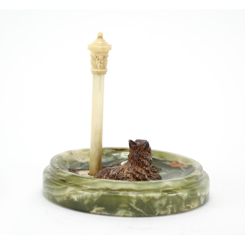 9 - Green onyx, ivory and cold painted bronze model of a terrier beside a lamppost, 11cm high