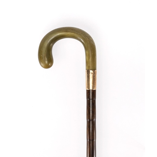 81 - Horn handled walking stick with 9ct gold collar, 92cm in length