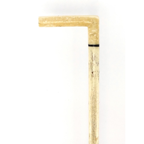 73 - Antique carved whale bone walking stick with marine ivory handle, 81cm in length