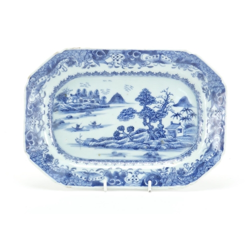 318 - Chinese blue and white porcelain shallow dish, hand painted with a river landscape, 25.5cm wide