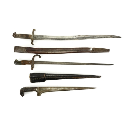 256 - Two Military interest long bayonets and an Afghan dagger with scabbard, the largest 74cm in length