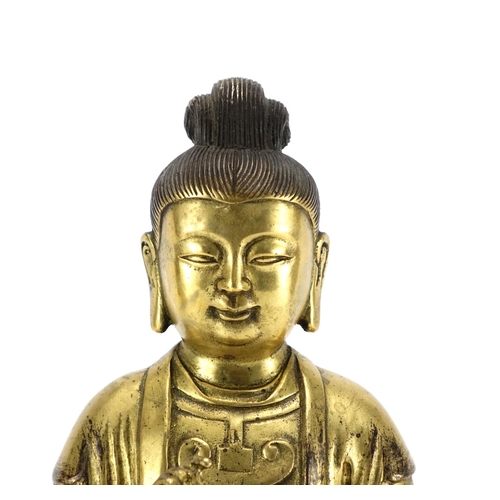 351 - Chino-Tibetan gilt bronze figure of Buddha, 30cm high