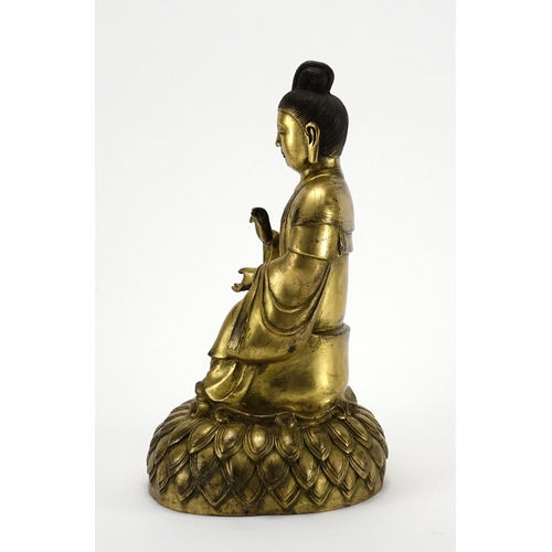 351 - Chino-Tibetan gilt bronze figure of Buddha, 30cm high