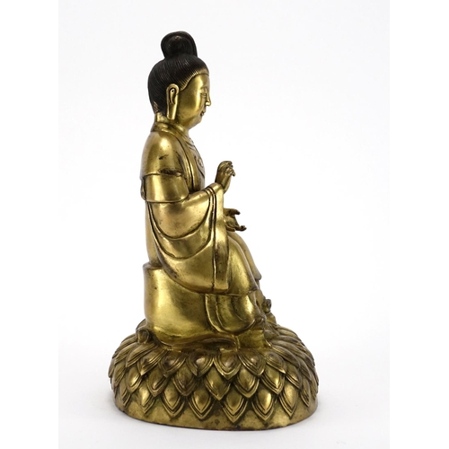 351 - Chino-Tibetan gilt bronze figure of Buddha, 30cm high