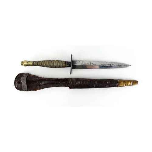 267 - Fairbairn Sykes ring and beaded fighting knife with leather sheath, 31cm in length