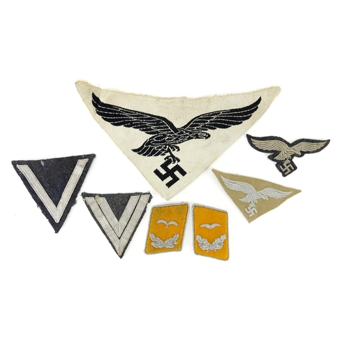 231 - Group of German Military interest cloth patches and epaulettes