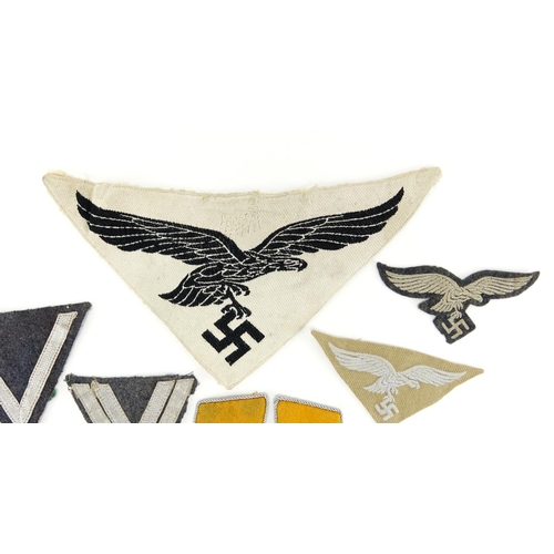 231 - Group of German Military interest cloth patches and epaulettes