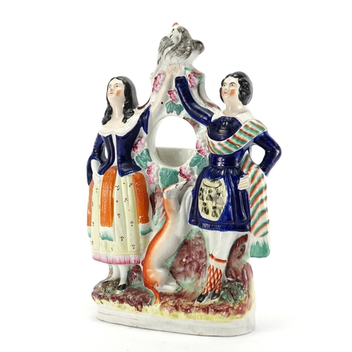 498 - Victorian Staffordshire flat backed Highland Dancers watch stand, 33cm high