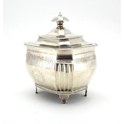 601 - Georgian silver lockable tea caddy, with engraved decoration, raised on four feet, by William Batema... 