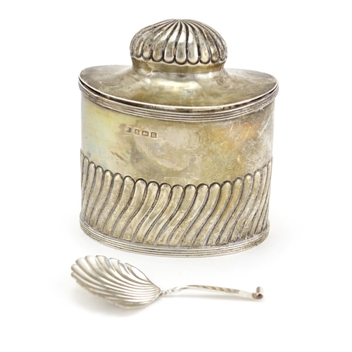 618 - Silver demi fluted tea caddy with fitted spoon to the interior and hinged lid, indistinct makers mar... 