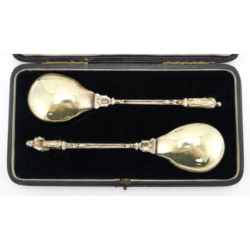 640 - Pair of Victorian silver gilt apostle spoons by Louise Landsberg, London import marks 1894, housed i... 