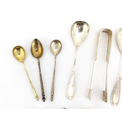 661 - Russian silver flatware including a set of six silver teaspoons and a pair of sugar tongs, each with... 