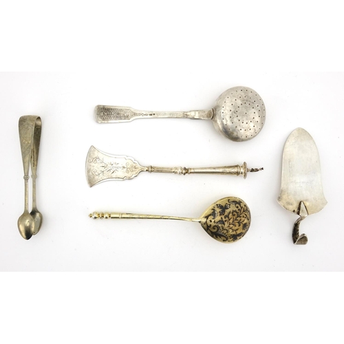 659 - Russian silver flatware including a sifting spoon, cake server and a pair of white metal sugar tongs... 