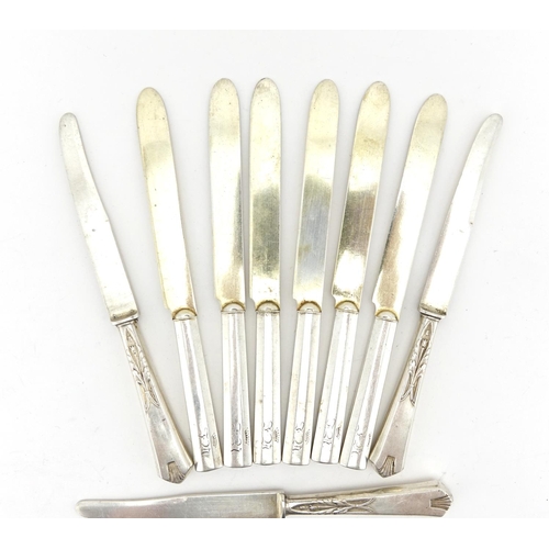 656 - Thirteen Russian silver knives and forks some with stylised flower handles, each with impressed 84 m... 