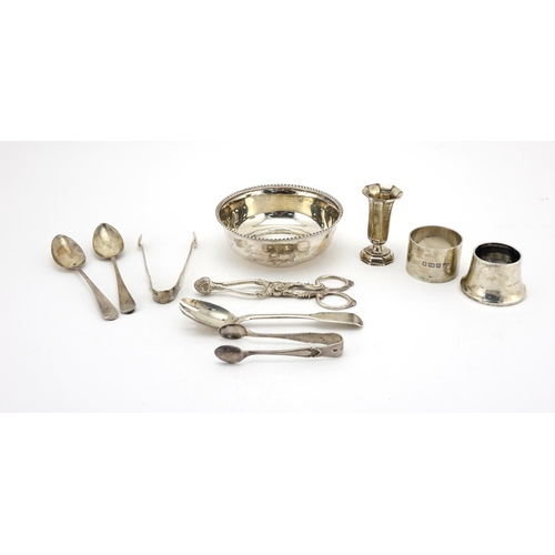 654 - Silver objects including circular bowl, Victorian sugar nips and Georgian teaspoons, various hallmar... 