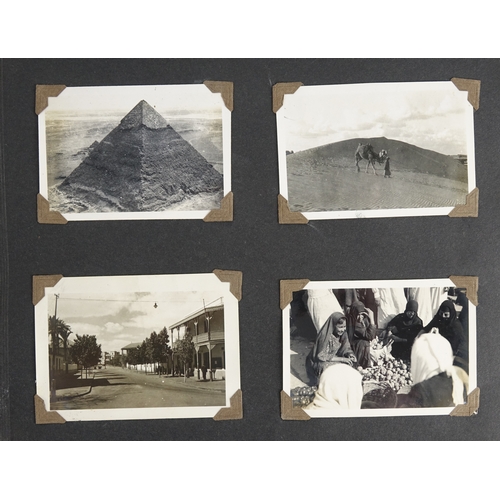138 - Four early 20th century black and white photograph albums including The Middle East Silverstone Park... 