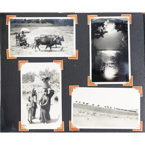 138 - Four early 20th century black and white photograph albums including The Middle East Silverstone Park... 