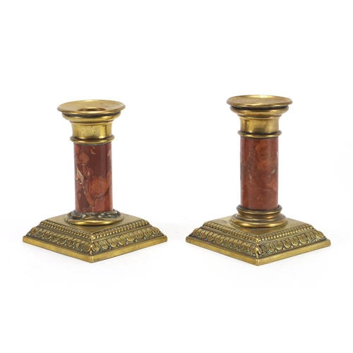 17 - Pair of brass candlesticks with cylindrical marble columns, 12cm high