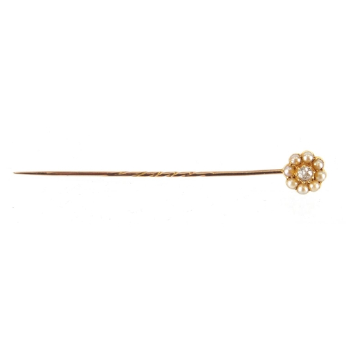 750 - Unmarked diamond and seed pearl tie pin, housed in a Junghans tooled leather box, 7cm in length, app... 