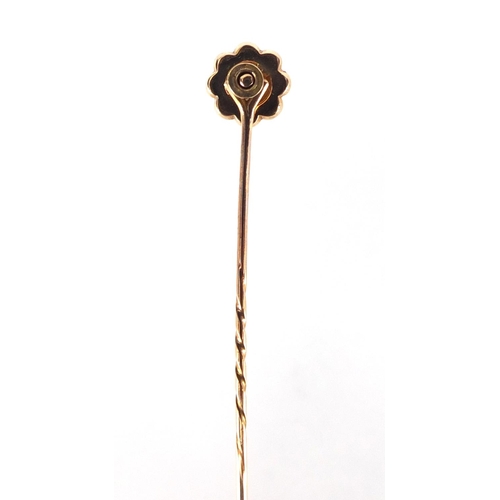 750 - Unmarked diamond and seed pearl tie pin, housed in a Junghans tooled leather box, 7cm in length, app... 