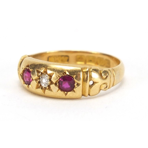 752 - 18ct gold diamond and ruby ring, size M, approximate weight 2.7g