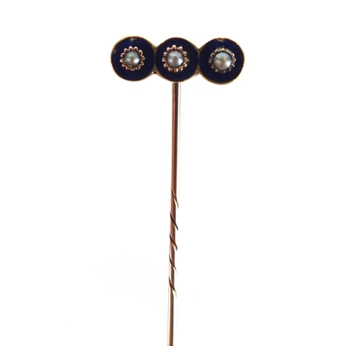 765 - Unmarked gold seed pearl and blue enamel tie pin, 7.5cm in length, approximate weight 2.9g