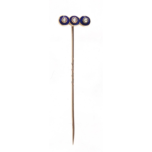 765 - Unmarked gold seed pearl and blue enamel tie pin, 7.5cm in length, approximate weight 2.9g