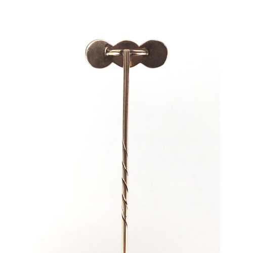 765 - Unmarked gold seed pearl and blue enamel tie pin, 7.5cm in length, approximate weight 2.9g