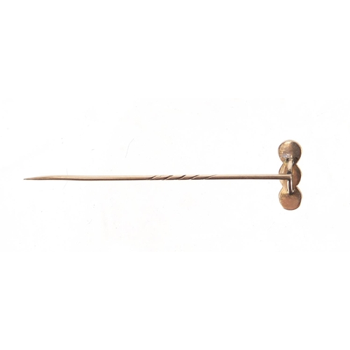 765 - Unmarked gold seed pearl and blue enamel tie pin, 7.5cm in length, approximate weight 2.9g