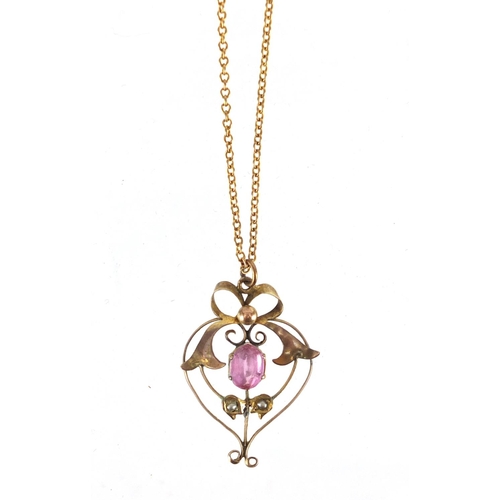 775 - Art Nouveau 9ct gold pink stone and seed pearl pendant, on a 9ct gold necklace, the pendant 3.2cm in... 