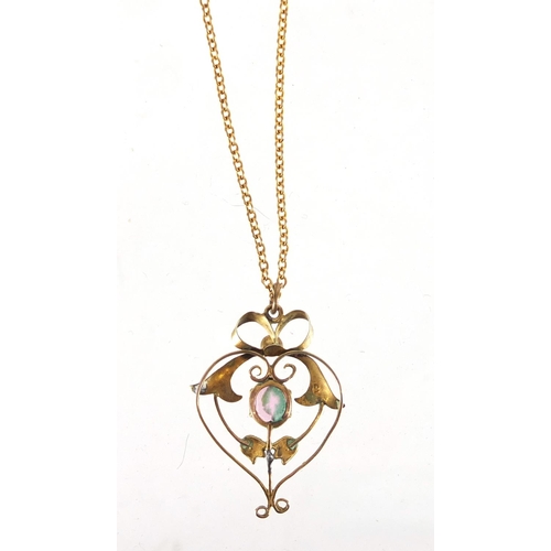 775 - Art Nouveau 9ct gold pink stone and seed pearl pendant, on a 9ct gold necklace, the pendant 3.2cm in... 