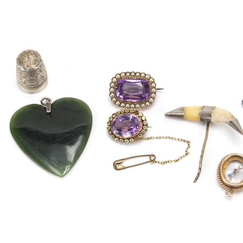 795 - Antique and later jewellery including a Victorian unmarked gold amethyst and seed pearl brooch, unma... 