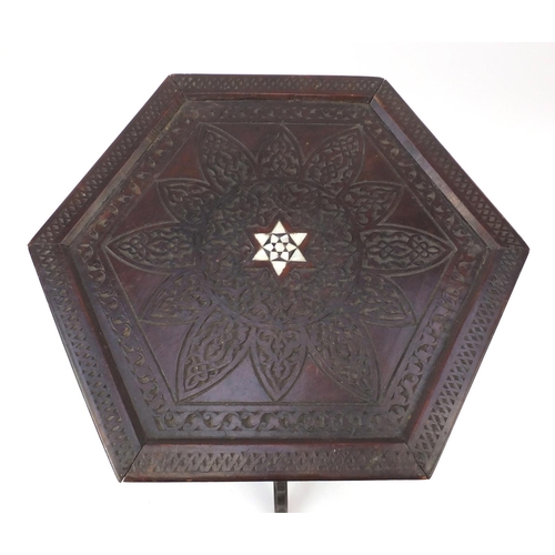 481 - Middle Eastern hardwood stand, with hexagonal top and Mashrabiya panels, carved with foliate motifs,... 