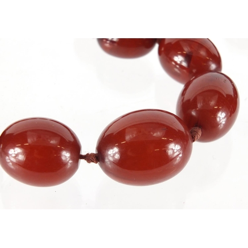 811 - Amber coloured bead necklace, 76cm in length, approximate weight 70.0g