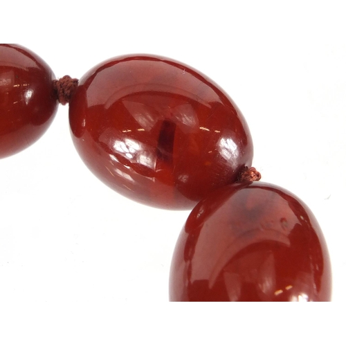 811 - Amber coloured bead necklace, 76cm in length, approximate weight 70.0g