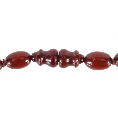 811 - Amber coloured bead necklace, 76cm in length, approximate weight 70.0g