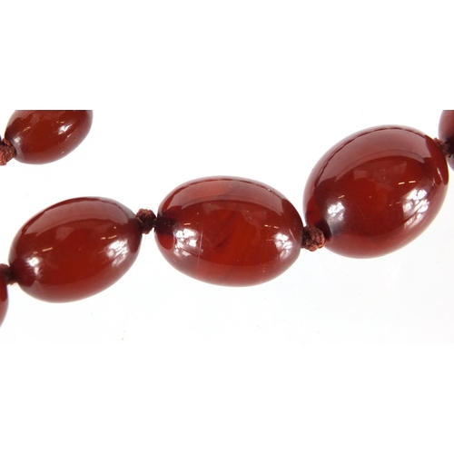 811 - Amber coloured bead necklace, 76cm in length, approximate weight 70.0g