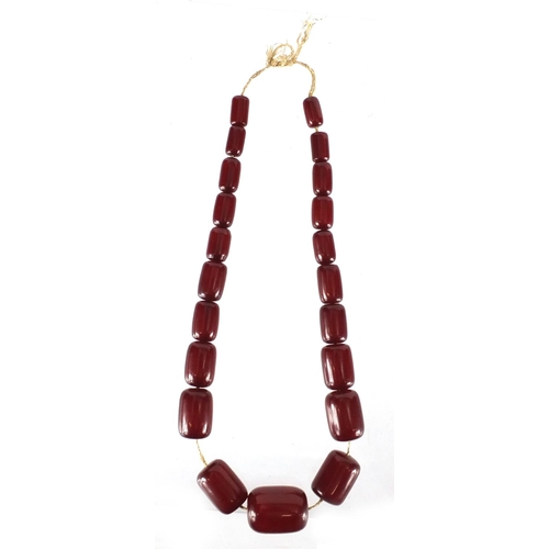 814 - Cherry amber coloured bead necklace, 44cm in length, approximate weight 60.0g