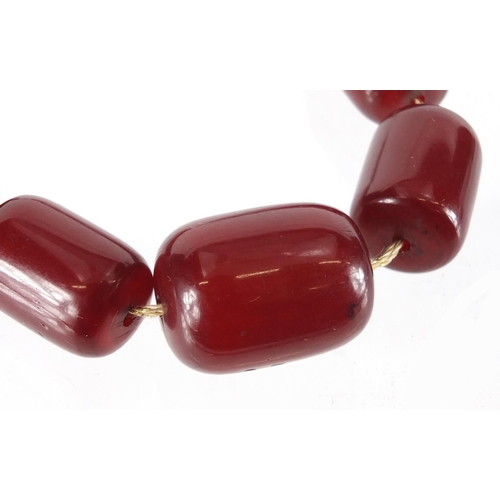 814 - Cherry amber coloured bead necklace, 44cm in length, approximate weight 60.0g