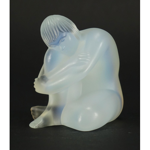 517 - Lalique frosted opalescent glass paperweight of a nude female, with box etched Lalique France to the... 