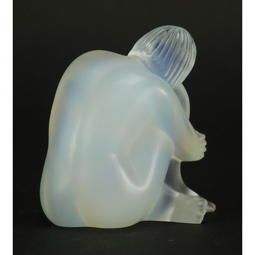517 - Lalique frosted opalescent glass paperweight of a nude female, with box etched Lalique France to the... 