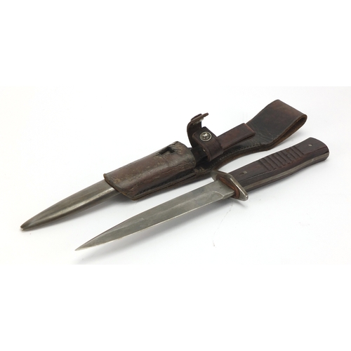 265 - German Military interest dagger with scabbard and leather frog, the steel blade impressed Gottlieb H... 