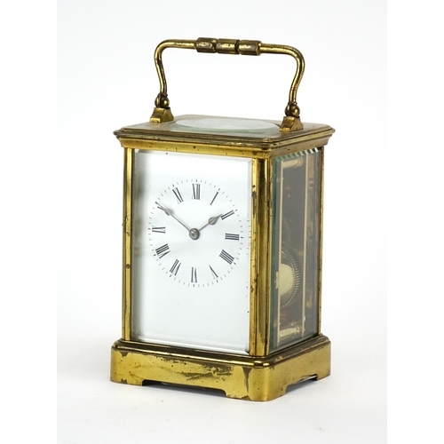 2127 - 19th century brass cased carriage clock striking on a gong, with enamelled dial and Roman numerals, ... 