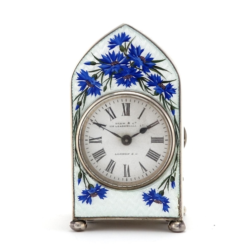 2379 - Silver and guilloche enamel clock, decorated with blue flowers, the dial marked Drew & Co, 156 Leade... 