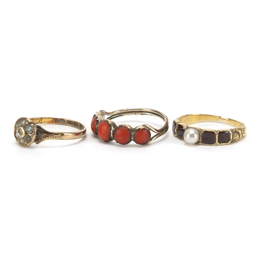 715 - Three antique gold rings including coral, seed pearl and garnet, various sizes, approximate weight 4... 