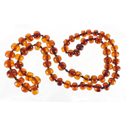 816 - Natural amber coloured bead necklace, 90cm in length, approximate weight 100.0g