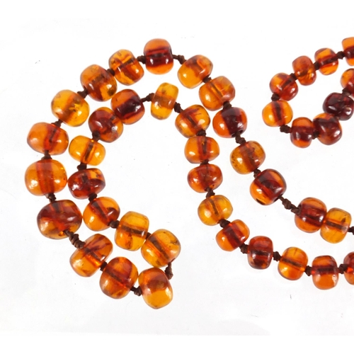 816 - Natural amber coloured bead necklace, 90cm in length, approximate weight 100.0g