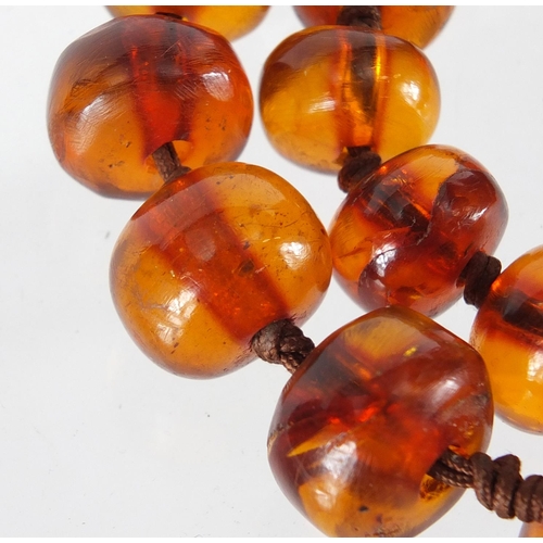 816 - Natural amber coloured bead necklace, 90cm in length, approximate weight 100.0g