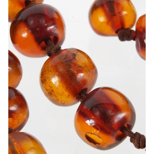 816 - Natural amber coloured bead necklace, 90cm in length, approximate weight 100.0g