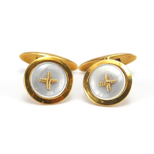 2454 - Pair of continental gold and Mother of Pearl cuff links, indistinct marks, 1.5cm in diameter, approx... 